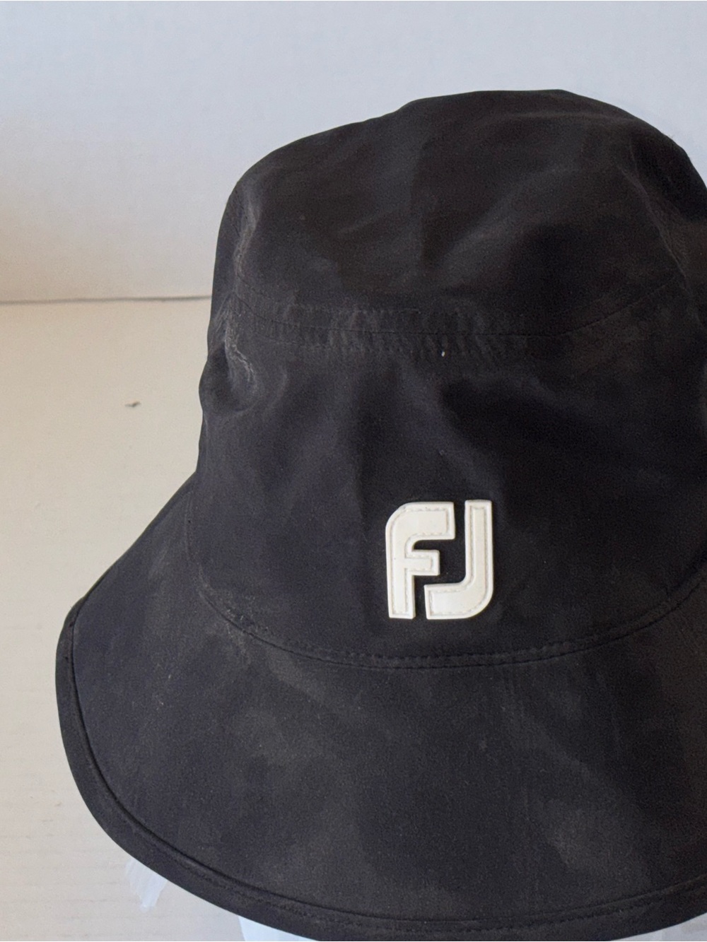 FootJoy Black Bucket Hat with White FJ Logo
